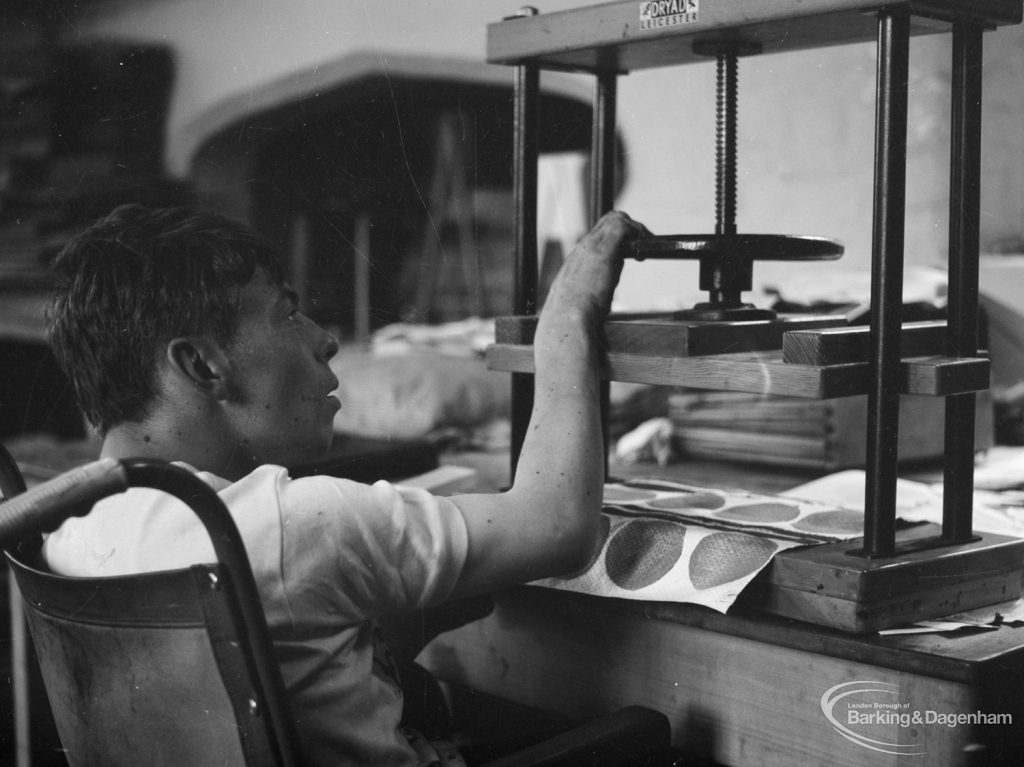 Training Centre at Eastbury House, Barking, showing man working at press, 1966