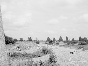 Central stretch on east of Evenlode Way, Dagenham after demolition of prefabs, with rubble, 1966
