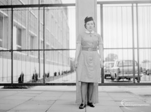 Public Health, showing nurse in uniform by pillar at Civic Centre, Dagenham, 1966