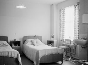 Elderly people welfare, showing bedroom with two beds and washbasin at Saywood Lodge, Weston Road, Dagenham, 1966