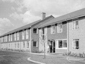 Exterior of terraced houses [possibly in Dagenham], looking south across green, 1966