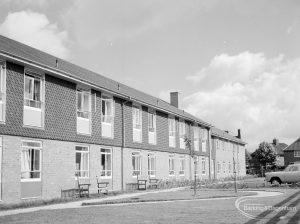 Exterior of terraced houses and gardens with lawns [possibly in Dagenham], looking from south, 1966