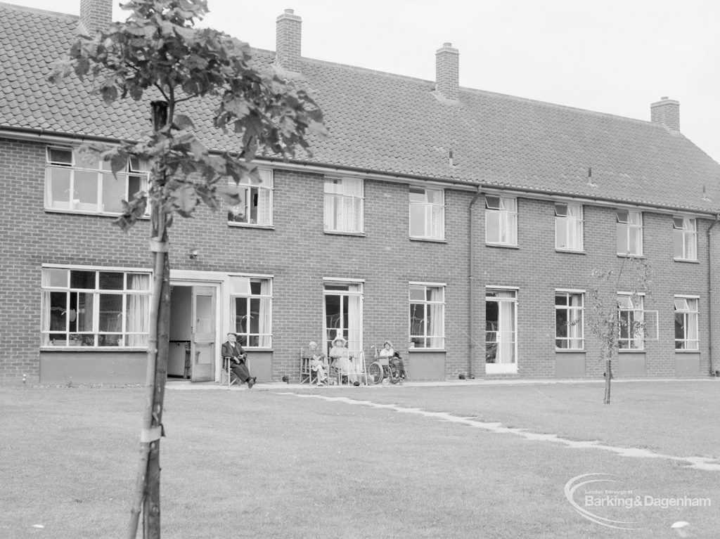 Mayesbrook Home, Devon Road, Barking showing sheltered housing for the elderly facing Mayesbrook Home across green, 1966