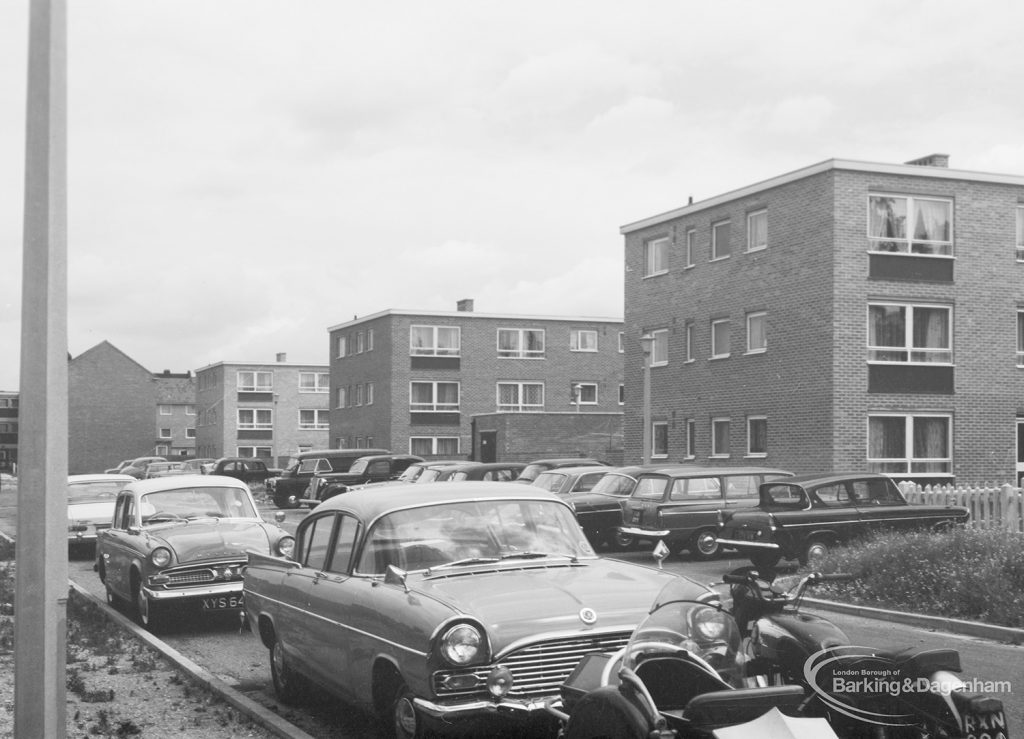 Parked cars and blocks of flats possibly at Ibscott Place, Dagenham,1966