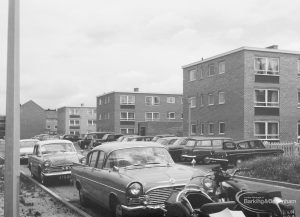 Parked cars and blocks of flats possibly at Ibscott Place, Dagenham,1966