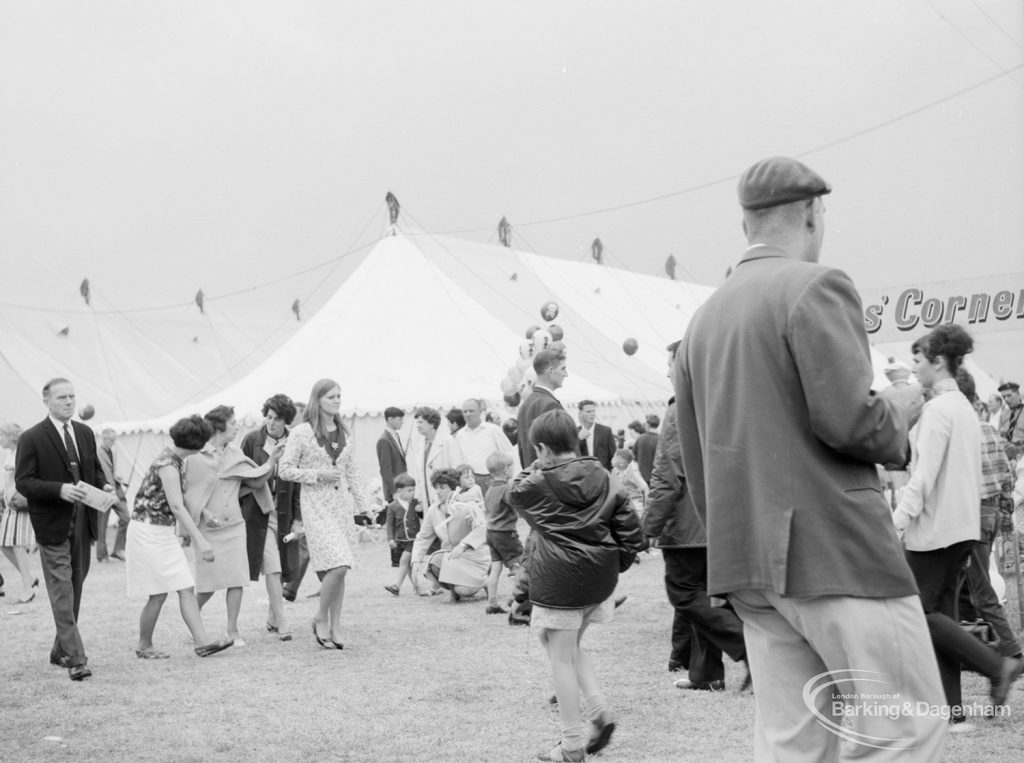 Dagenham Town Show 1966, showing spectators walking in the Avenue, with balloon seller in background, 1966