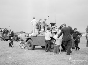 Dagenham Town Show 1966, showing children climbing on an amoured car, 1966