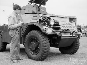 Dagenham Town Show 1966, showing a visitor standing next to a tank in the Second Royal Tank Regiment, 1966