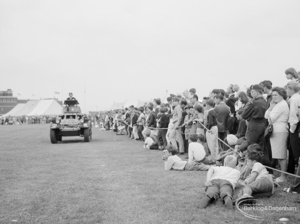 Dagenham Town Show 1966, showing spectators watching tanks from the second Royal Tank Regiment leaving the Arena, 1966