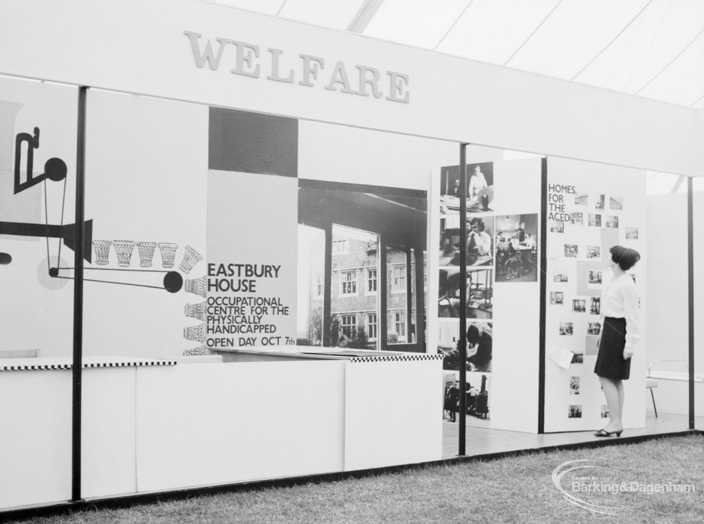 Dagenham Town Show 1966 at Central Park, showing woman looking at Civic Services Welfare display stand, taken from east, 1966