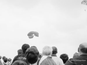 Dagenham Town Show 1966 at Central Park, showing Parachute Jumping display, with spectators watching two approaching parachutes, 1966