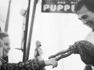 Dagenham Town Show 1966 at Central Park, showing puppet crocodile biting hand in Further Education Display, 1966