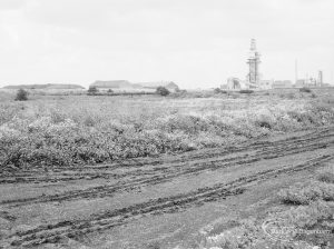 Riverside Sewage Works Reconstruction XII, showing panoramic view of undeveloped area, with rough dirt tracks amongst wild flowers and with industrial buildings on horizon [sequence running from left to right EES11459 – 60 – 66 – 65 – 62 – 67 – 63 – 64 – EES11461], 1966