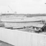 Riverside Sewage Works Reconstruction XII, showing sludge tanks and wall, 1966