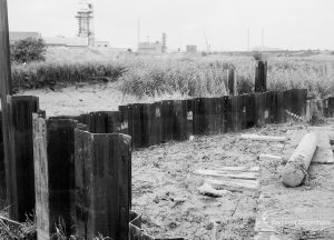 Riverside Sewage Works Reconstruction XII, showing interlocking steel fence to protect against flooding, 1966