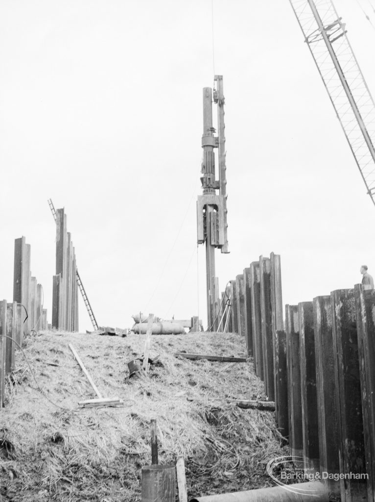 Riverside Sewage Works Reconstruction XII, showing construction of steel fence, 1966