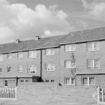 New three-storey housing in Gascoigne area, behind flanking wall and with pavement, 1966