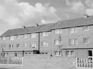 New three-storey housing in Gascoigne area, behind flanking wall and with pavement, 1966