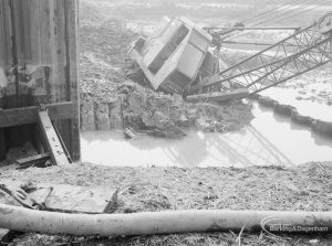 Riverside Sewage Works Reconstruction, showing Hadsphaltic digger submerged in clay, seen from dam, 1966