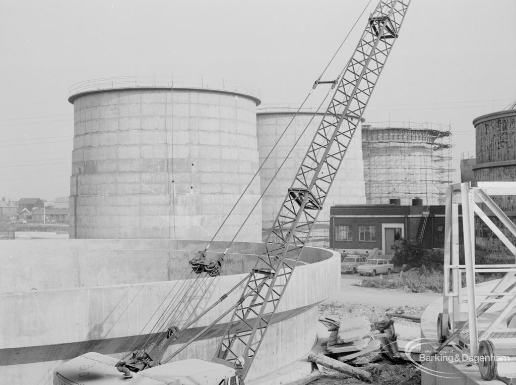 Riverside Sewage Works Extension XIII, showing three circular towers and one circular dish in foreground, 1966