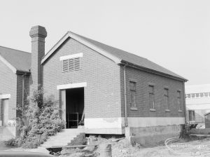 Riverside Sewage Works Extension XIII, showing the redundant brick house and new control hall beyond, 1966