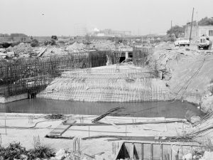Riverside Sewage Works Extension XIII, showing excavation and reinforced foundations by road, 1966