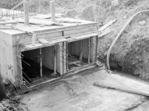 Riverside Sewage Works Extension XIII, showing twin square-section culverts leading to level, 1966