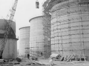 Riverside Sewage Works Extension XIII, showing four towering digesters, 1966