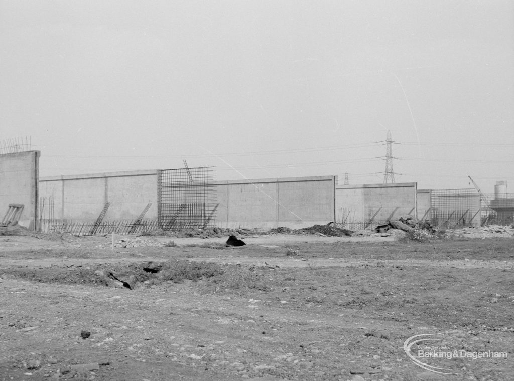 Riverside Sewage Works Extension XIII, showing distant view of high walls for storm tanks, 1966