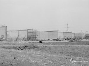 Riverside Sewage Works Extension XIII, showing distant view of high walls for storm tanks, 1966