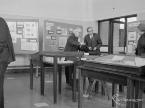 Barking Abbey 1300th anniversary exhibition at Barking Central Library, showing Mr J Howson talking to Mr S A Jewers, formerly the Town Clerk of the Borough of Barking, 1966