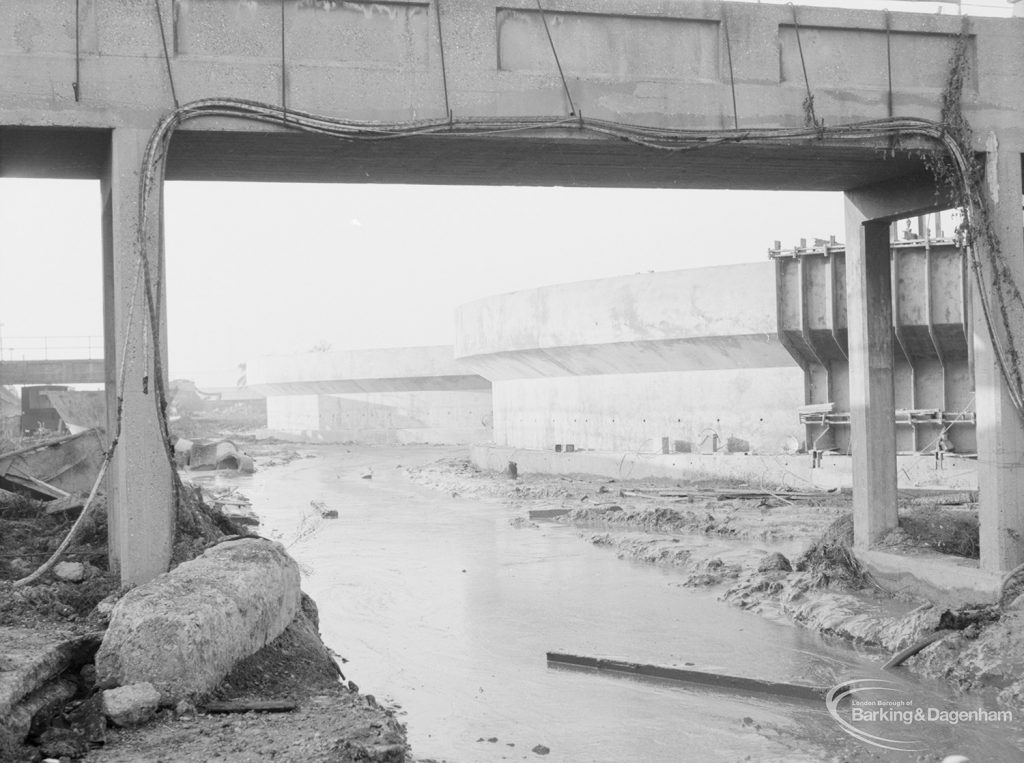 Riverside Sewage Works Reconstruction XIV, showing view of unbanked stream below conduit, 1966