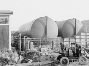 Riverside Sewage Works Reconstruction XIV, showing two new cylindrical containers on east edge, 1966