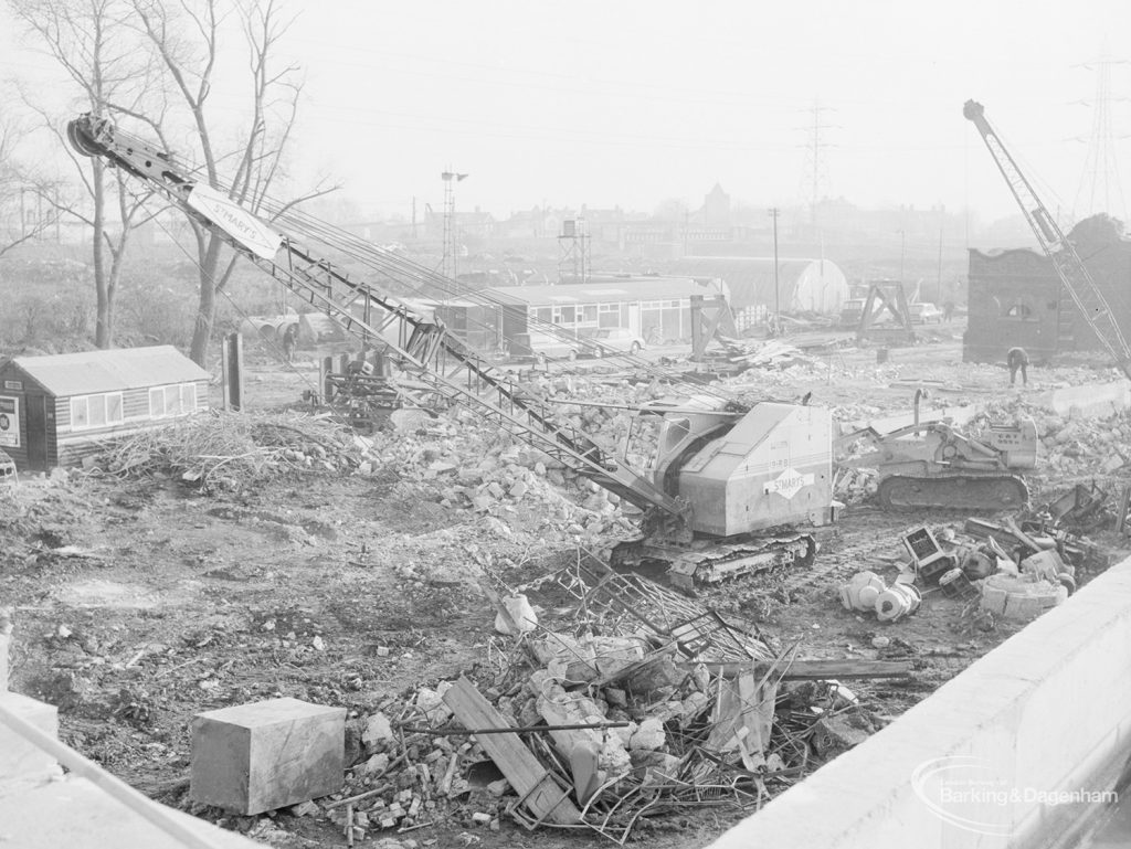 Riverside Sewage Works Reconstruction XIV, showing grabs and diggers preparing ground for extension, 1966