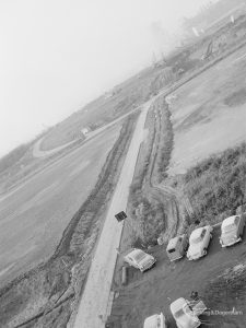 Riverside Sewage Works Reconstruction XIV, showing aerial view of road leading in distance to New Road, 1966