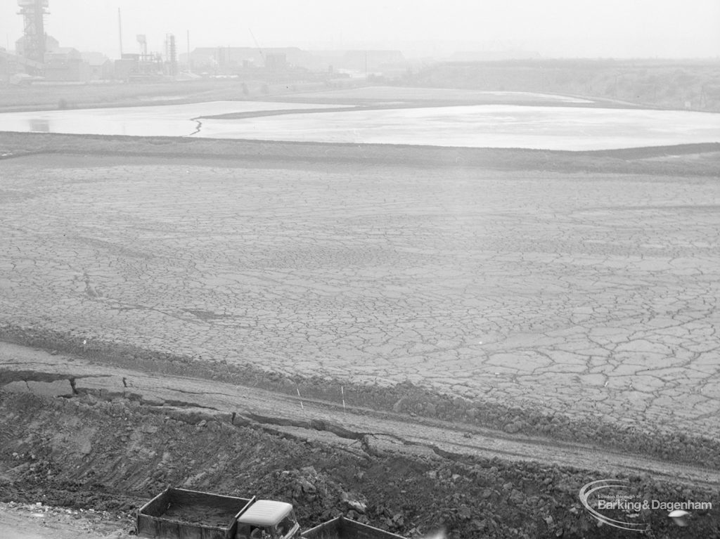 Riverside Sewage Works Reconstruction XIV, showing cracked smooth mud and dyke [continuation of EES11721 and to left], taken from above, 1966