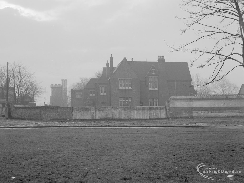 Barking Church of England School, later known as St. Margaret’s Church of England School, Back Lane, Barking, showing main school building and St Margaret’s Church in background (at left), 1967
