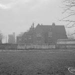 Barking Church of England School, later known as St. Margaret’s Church of England School, Back Lane, Barking, showing main school building and St Margaret’s Church in background (at left), 1967
