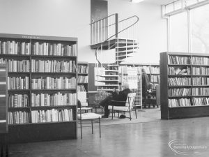 London Borough of Havering Central Library, Romford, showing lending department and open spiral staircase, 1967
