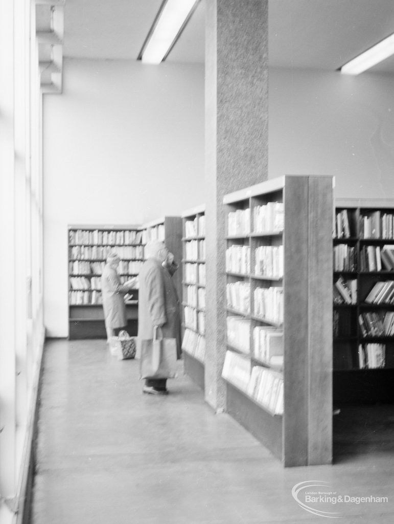London Borough of Havering Central Library, Romford, showing readers at bookcases by windows, 1967