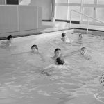 Swimming pool at Faircross Special School, Hulse Avenue, Barking, showing boys playing with ball, 1967