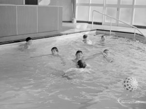 Swimming pool at Faircross Special School, Hulse Avenue, Barking, showing boys playing with ball, 1967