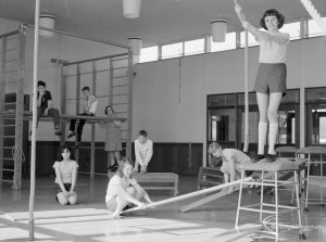 Faircross Special School, Hulse Avenue, Barking, showing gymnasium with rope climbing and group of children, 1967