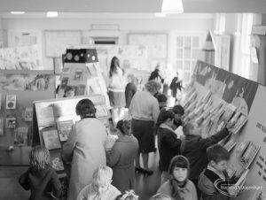 Barking Libraries Children’s Book Week at Valence House, Dagenham, showing crowd of adults and children looking at display stands, 1967