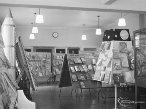 Barking Libraries Children’s Book Week at Valence House, Dagenham, showing books on a freestanding pyramid and other display stands, 1967