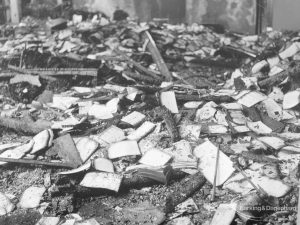 Fire at Barking Central Library, showing litter of charred books on floor, 1967