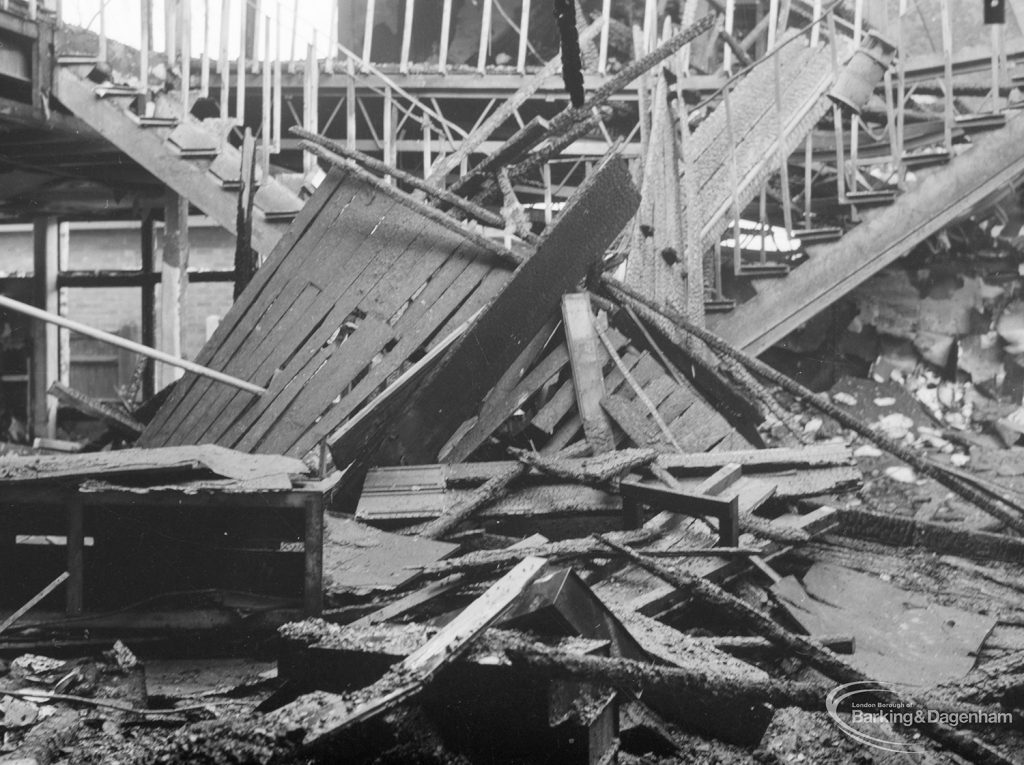 Fire at Barking Central Library, showing collapsed timbers and roofing on ground floor, 1967