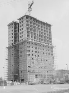Housing development, showing ‘twin’ towers of blocks of flats at Becontree Heath, and top six floors free of scaffolding, 1967