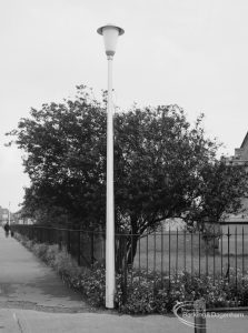 Lighting, showing locally designed lamp-post with tapered lantern at junction of Urswick Road and Vincent Road, Dagenham, in front of tree, 1967