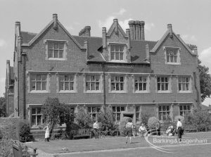 Eastbury House, Barking after restoration, showing the east exterior and group of disabled children, 1967